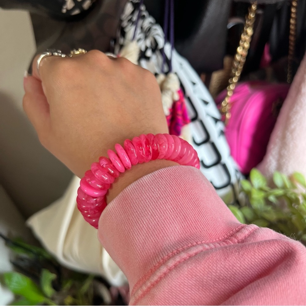Any questions ask pink bracelet